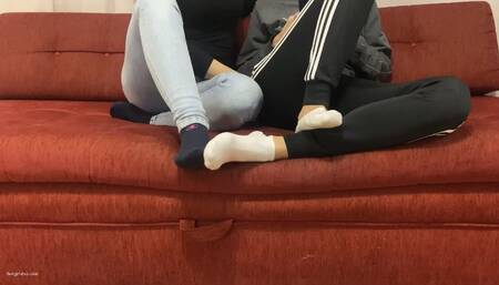 TWO GIRLS PLAYING SEXY FOOTSIE IN SOCKS BIG AND SMALL FEET - MOV MOB