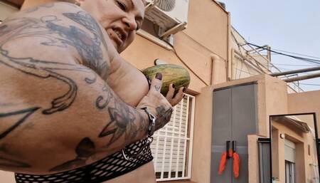 fbb big thickness muscle crushing smashing squezzing watermelon with her huge hands pec bouncing full doing juice with big biceps pose