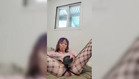 Stretching with a dragon dildo