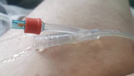 Playing with my catheter and cock 4
