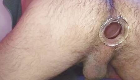 Huge glass butt plug stretching