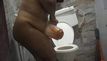 Tamil aunty hot bath at bathroom and wearing saree