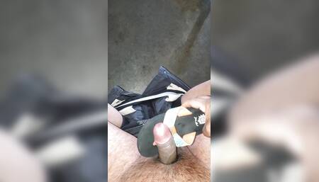mechanic alone in the shop with cute flip-flops