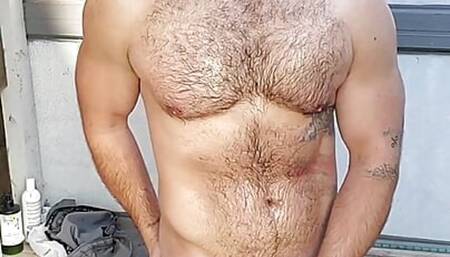 Muscle jock cums after sexy oil shower, slow mo hands free cum