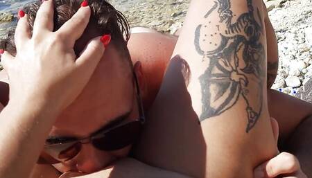 Our summer sex on the beach. I lie in the sun and lick my juicy pussy until she cums.