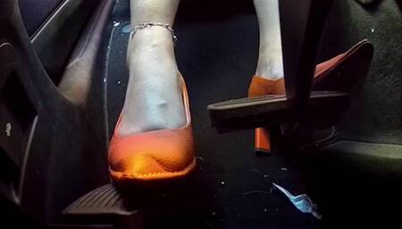 Driving my Luxury SUV in Orange Heels with one foot on the accelerator and one foot on the brake (Part 1)