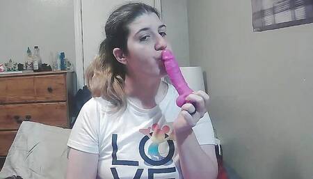 Blowing a dildo