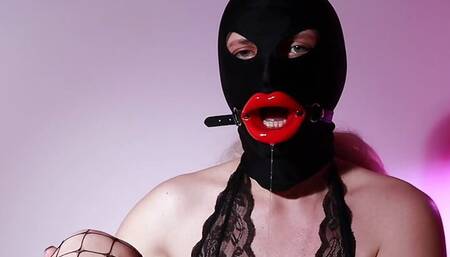 Young masked Sissy deep throats and fucks her dildo