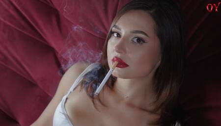 Marlboro hanging from red lipstick