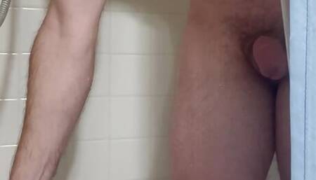 Sexy jock gets ready for a shower and pees