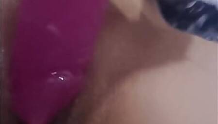 Whore stepmom masturbates her clit with her fingers and puts a dildo in her pussy