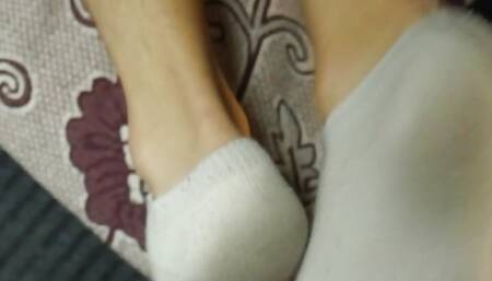 Friend gives me his feet in public train