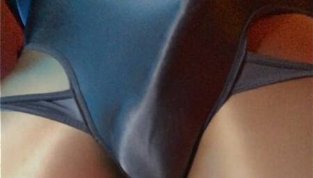 Getting horny touching my hard cock bulge under silver shiny Lycra bodysuit