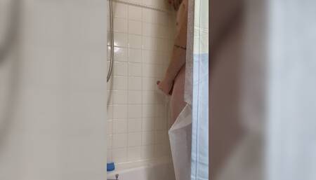 Daddy has a huge cumshot in gym shower