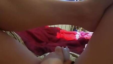 Milf plays with her pussy