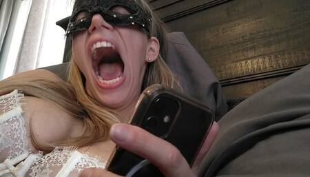 Scrolling on my phone and yawning