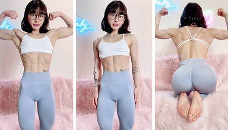 Adorable petite and nerdy Asian muscle girl flexes for you in leggings