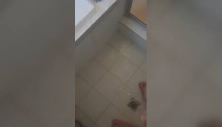 Uncut Aussie Strokes His Hard Cock in the Shower and Pees