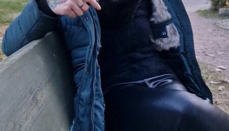 Smoking in Public with big Hood and Leather Leggings