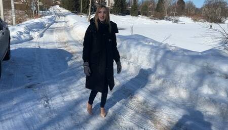girl in high-heeled shoes and straps climbs an ice slide, falls and twists her foot, now she can’t walk