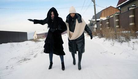 Two hot hotties in high heels slip and fall in the snow