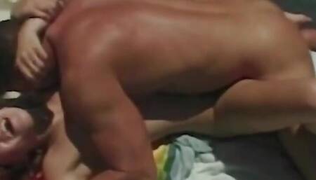 A Saucy Redhead Gets Her Pussy Eaten by the Pool and Gives a Footjob