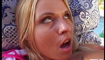 Blonde babe gets her pussy destroyed by a black man outside on the sunbed