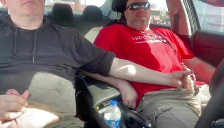 Stroking our Cocks In car in a parking lot