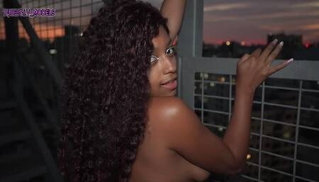 Naked girl on the fire escape, Novinha showing off naked on the fire escape