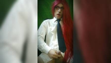 The crossdresser is playing with his dick.