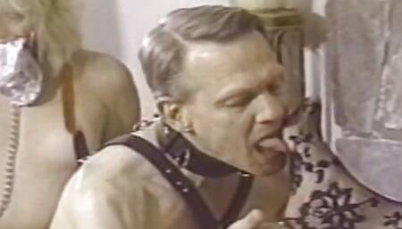 Latex mistress dominating slave couple
