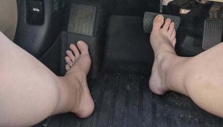 Fifi driving barefoot and getting out in a bluebonnet field