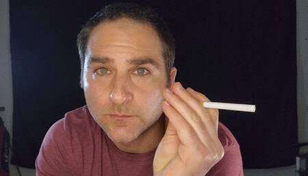 Close up hot guy smoking Marlboro Red 100 cigarette