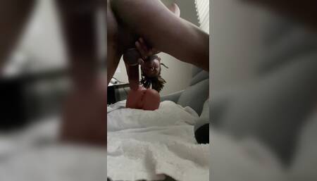 Ebony twink plays with toy