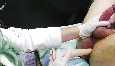 doctor performs anal exam whith long dildo