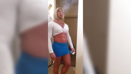 Pretty Tgirl smoking & stripping