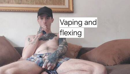 Skinny guy flexing and vaping