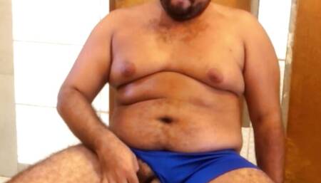 Chubby gay man smoking and cumming