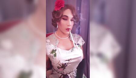 Elegance, a long cigarette, and some dangled snap inhales....