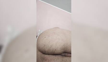 Lying naked doing nothing