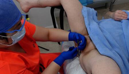 Doctor Jess performs medfet anal rectal stretching surgery on her patient