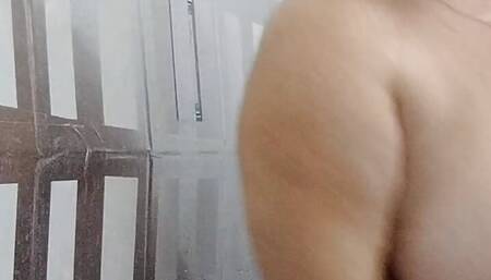 Naked stepmom with big tits and ass takes a shower