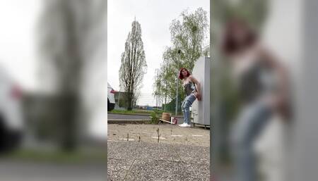 Fucking the dildo on the street