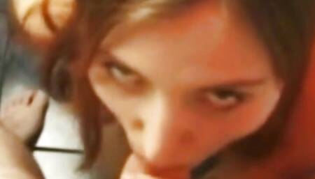 Redhead sticks a banana in her pussy before sucking a small dick