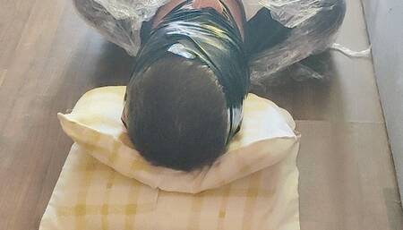 Wrapped up foot smothering and licking (Front view)