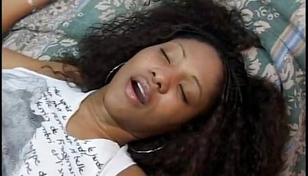 Cock sucking black slut is fucked on the couch