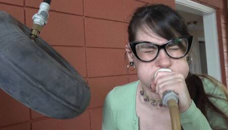 Ziva Tries to Inflate a Tire Inner Tube (MP4 - 720p)