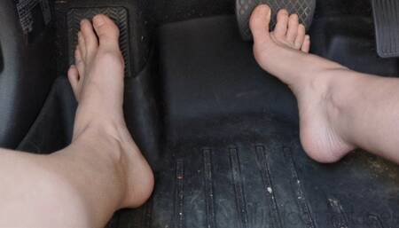 Fifi driving barefoot through lots of traffic to the store