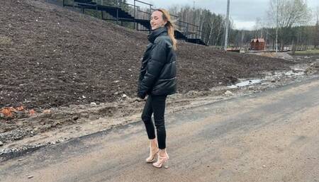 girl in transparent boots with open toes loves to dirty her boots with mud and gets pleasure from it