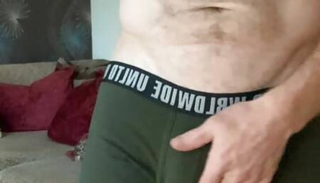 Task Borrow apprentices boxers and sport shorts and model them